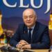 Three men, including Emil Boc of Cluj-Napoca, sitting at a table with microphones in front of them.