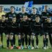 A group of Universitatea Cluj soccer players posing for a photo.